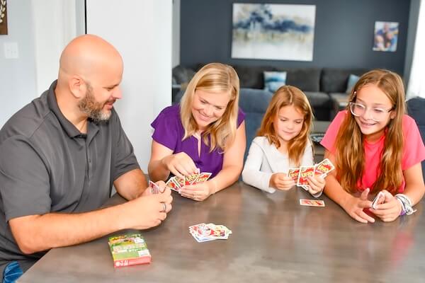 Kacey Carnegie sitting with her family
