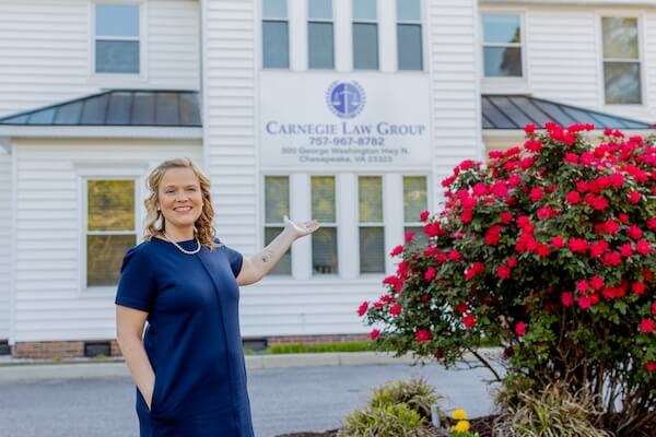 Kacey Carnegie outside her law firm